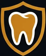 Tooth icon within a shield, symbolizing dental protection and care, relevant to LuxOra Dental's services in enhancing oral health and aesthetics.